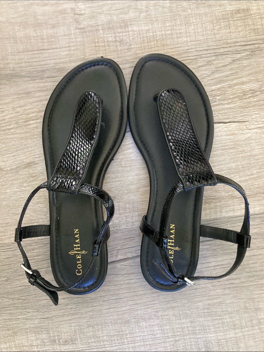 Black thong style sandals.